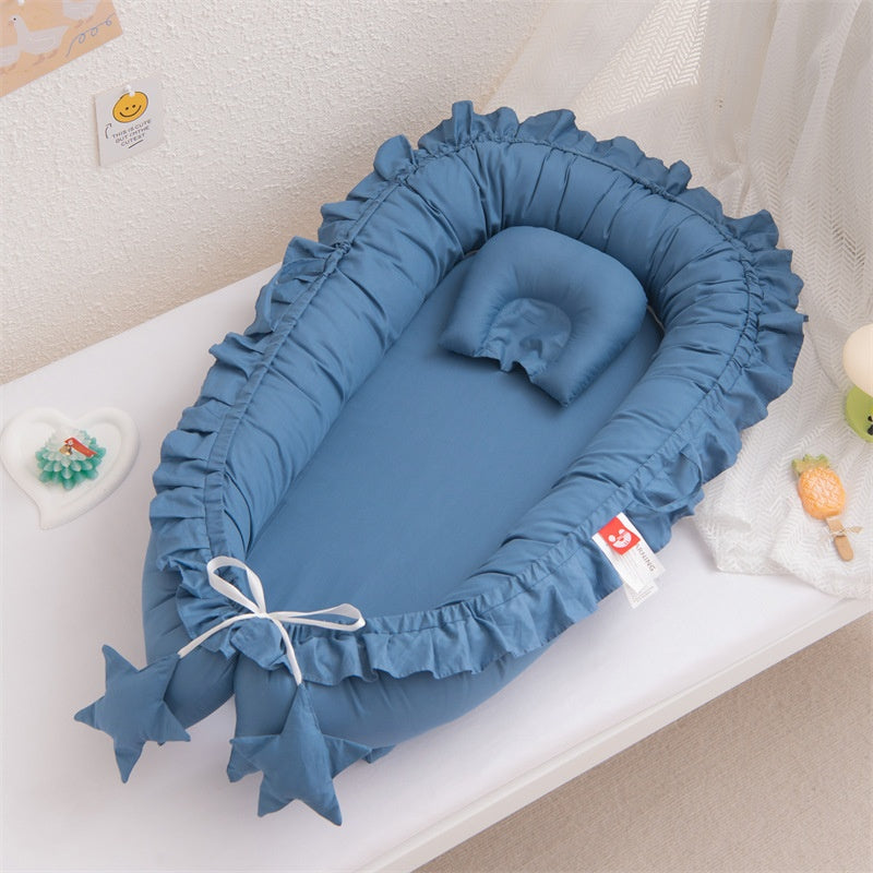 Nidu™ Baby Lounger — Organic Cotton Ruffle Nest