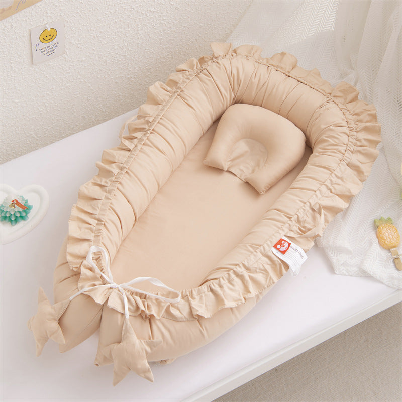 Nidu™ Baby Lounger — Organic Cotton Ruffle Nest