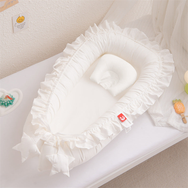 Nidu™ Baby Lounger — Organic Cotton Ruffle Nest