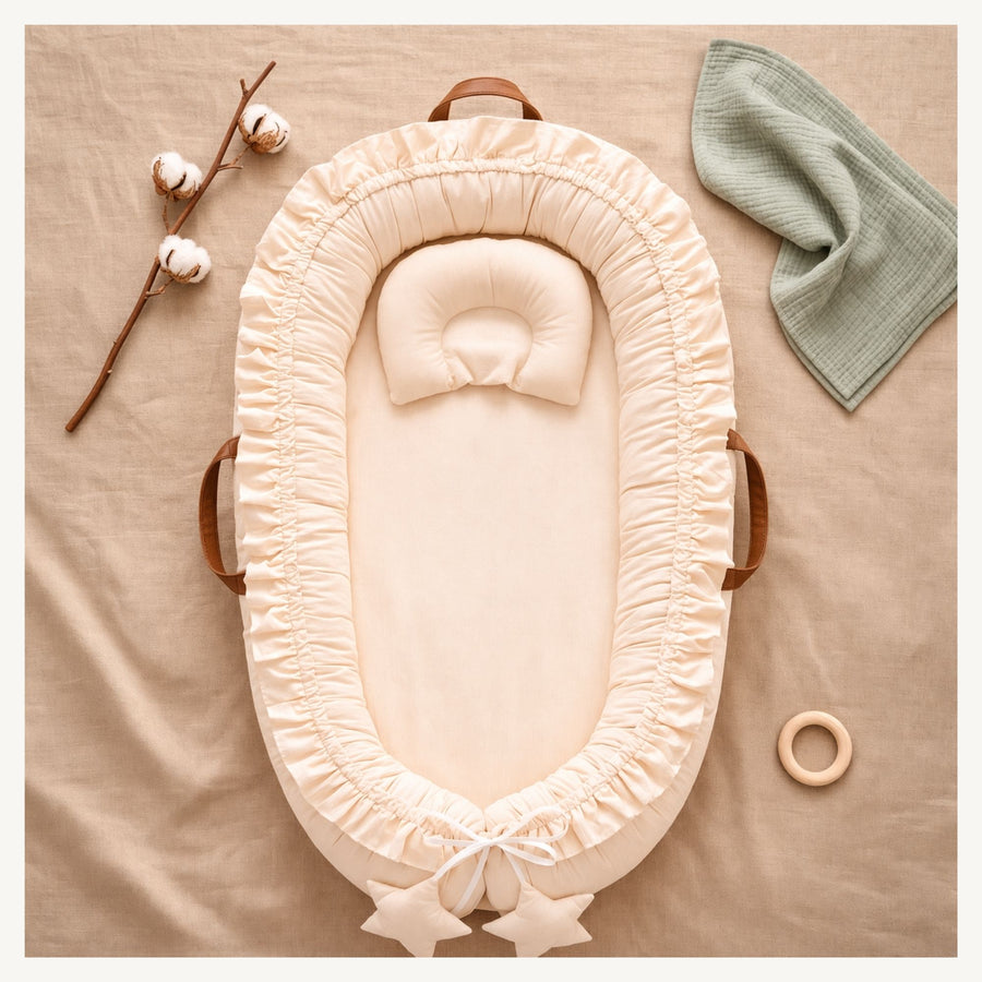 Nidu™ Baby Lounger — Organic Cotton Ruffle Nest
