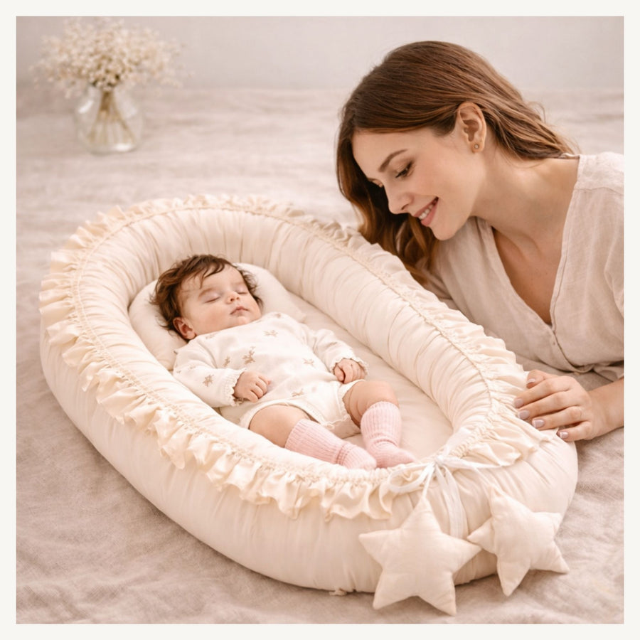 Nidu™ Baby Lounger — Organic Cotton Ruffle Nest