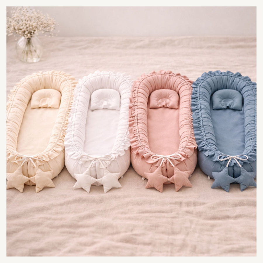 Nidu™ Baby Lounger — Organic Cotton Ruffle Nest