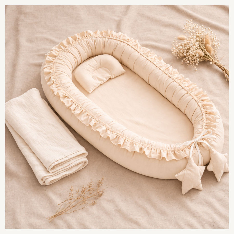 Nidu™ Baby Lounger — Organic Cotton Ruffle Nest