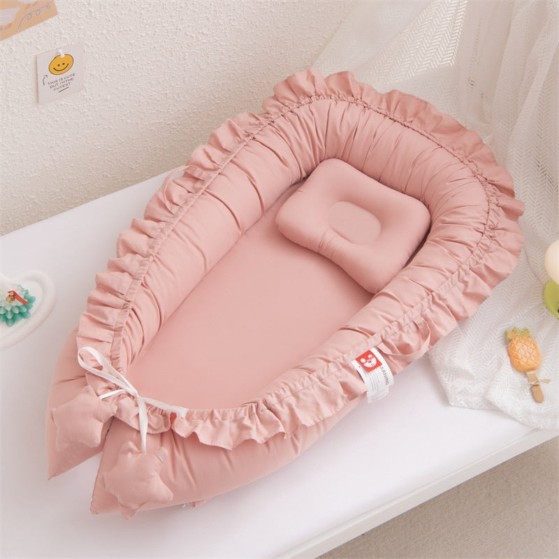 Nidu™ Baby Lounger — Organic Cotton Ruffle Nest